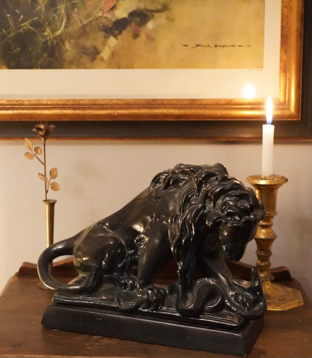 Lion With Serpent Sculpture